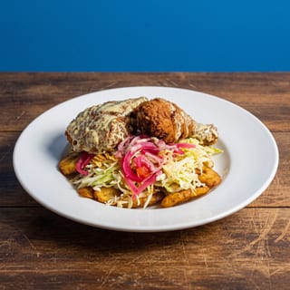Pollo con Tajadas / Chicken with Banana Chips